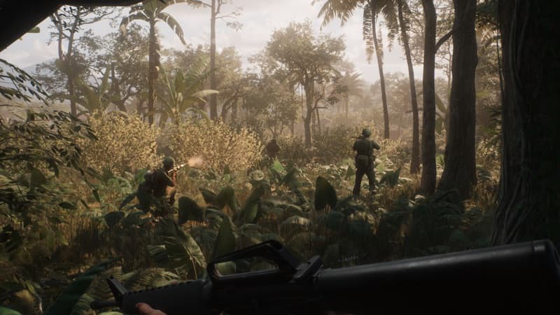 A squad moving through a cornfield and jungle cover