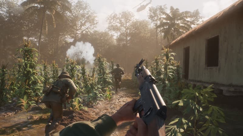 A squad moving through a cornfield with a helicopter overhead